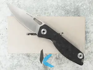 Used Real Steel Sidus,D2 Blade Steel,  Blue Shred Carbon Fiber Handles, with box