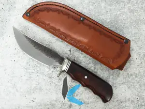 Pre-Owned Behring Made Camping/Hunting Knife with Leather Sheath